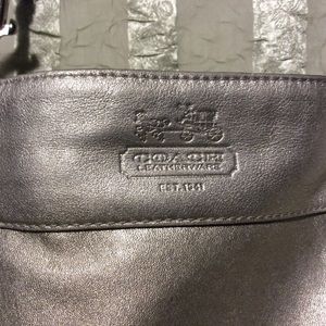 Elegant silver Coach. Mint condition.